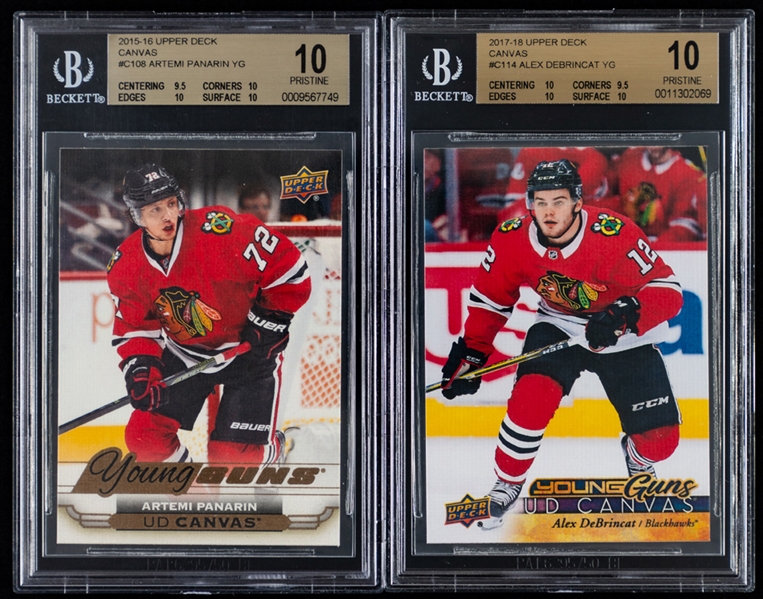 2015-16 UD Young Guns Canvas Hockey Card #C108 Artemi Panarin Rookie (Graded Beckett Pristine 10) and 2017-18 UD Young Guns Canvas Hockey Card #C114 Alex DeBrincat Rookie (Graded Beckett Pristine 10) 
