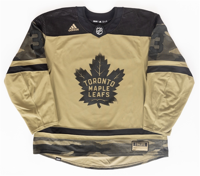 Justin Holl’s 2021-22 Toronto Maple Leafs Canadian Armed Forces Night Warm-Up Worn Jersey with Team LOA