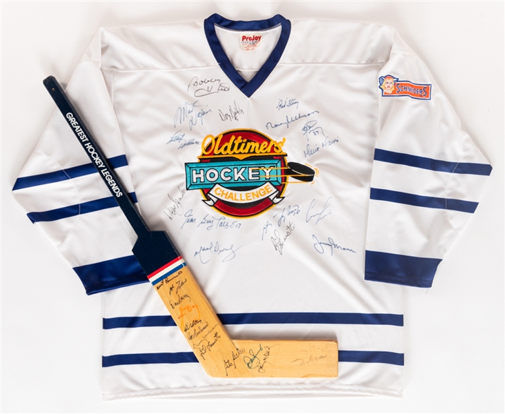 1995 Oldtimers Hockey Challenge Jersey Plus Mini-Stick Signed by 26 Including HOFers Hull, Lafleur, McDonald, Ullman, Storey, Dionne and Others