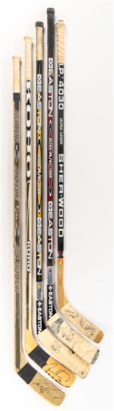 Edmonton Oilers 1990s Game-Used and Game-Issued Signed and Unsigned Stick Collection of 16 Including Kurri, Guerin, Weight, Brathwaite, Arnott and More 