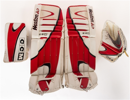 Ed Belfours 2004 World Cup of Hockey Team Canada Practice-Worn/Game-Issued CCM Heaton 10 Goalie Pads, Blocker and Catcher from His Personal Collection with His Signed LOA