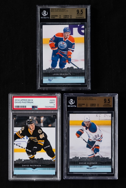 2014-15 Upper Deck Young Guns Complete Hockey Card Set Including #223 Leon Draisaitl Rookie (Beckett Gem Mint 9.5) and #495 David Pastrnak Rookie (PSA Mint 9)