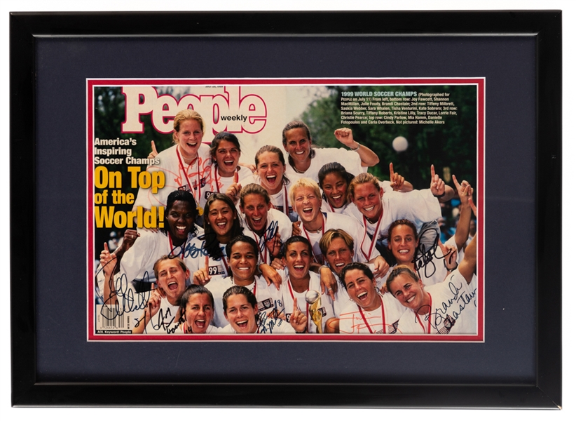 United States of America Womens National Soccer Team 1999 FIFA Womens World Cup Champions Team Signed Soccer Ball and People Magazine Centerfold Framed Display with JSA Auction LOA