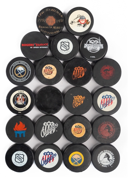 1950s to 2010s NHL and Minor League Puck Collection of 19 