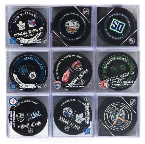 Game-Used and Warm-Up Used Puck Collection of 18 Plus Game-Issued and Official Game Pucks 