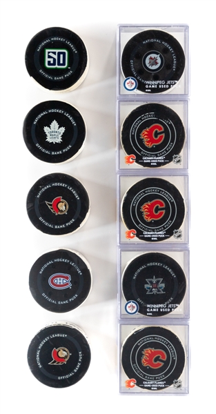Edmonton Oilers, Winnipeg Jets and Vancouver Canucks 2018 to 2022 Game-Used Goal Puck Collection of 10 - All With COAs! 