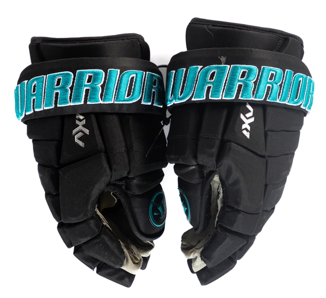 Erik Karlssons 2021-22 San Jose Sharks Warrior AX1 Game-Worn Gloves - Photo-Matched!