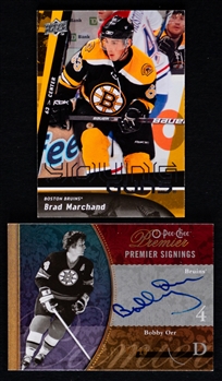 2009-10 to 2016-17 Boston Bruins Hockey Cards (5) Inc. 2009-10 OPC Premier Signings #PS-BO Bobby Orr (05/15) and 2009-10 UD Young Guns #452 Brad Marchand