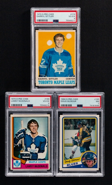 1970-71 OPC Hockey Card #218 HOFer Darryl Sittler Rookie (PSA 4), 1974-75 OPC Hockey Card #168 HOFer Lanny McDonald Rookie (PSA 4) and 1984-85 OPC Hockey Card #185 HOFer Doug Gilmour Rookie (PSA 7)