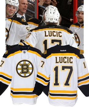 Milan Lucics 2011-12 Boston Bruins Game-Worn Jersey with LOA - Heavy Game Wear! - Numerous Team Repairs! - Photo-Matched!