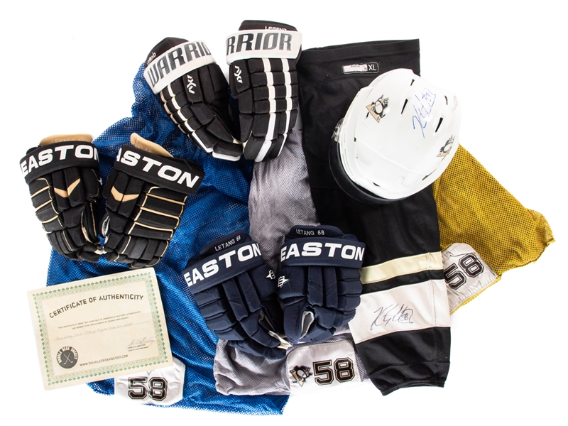 Kris Letangs Early-to-Mid-2010s Pittsburgh Penguins Game-Used Signed and Unsigned Equipment Collection Including Gloves (3), Helmet (1), Signed Game Sock (1) and Laundry Bags (3) - Photo-Matches!