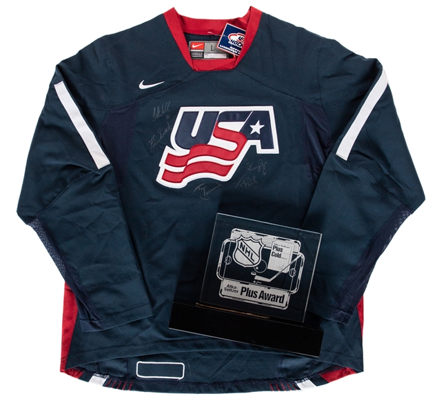 John LeClairs 2009 United States Hockey Hall of Fame Team USA Multi-Signed Jersey Including LeClair, Barrasso, Amonte and Bye Plus 1993-94 NHL Plus/Minus Award From His Personal Collection with LOA