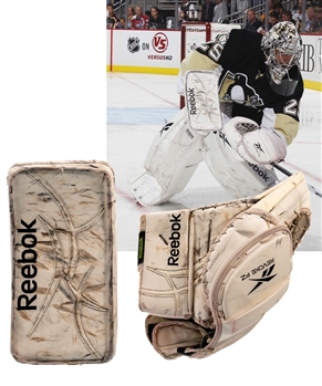 Marc-Andre Fleury’s 2010-11 Pittsburgh Penguins Reebok Revoke PZ Photo-Matched Game-Worn Glove and Blocker Plus Equipment Bag Attributed to Fleury