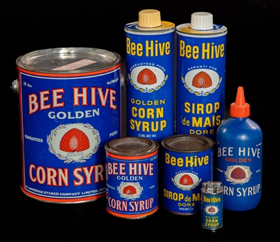 Vintage Bee Hive Corn Syrup Can and Memorabilia Collection of 7 Including Promotional Mini Can Cigarette Lighter