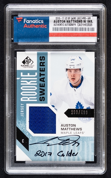 2016-17 Upper Deck SP Game Used Rookie Sweaters Hockey Card #RS-AM Auston Matthews (299/499) - Signed By Matthews with "2017 Calder" Inscription - Fanatics Authenticated