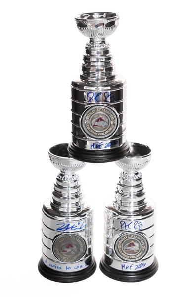 Colorado Avalanche Signed 1996 and 2001 Mini Stanley Cup Collection of 3 with Patrick Roy (1996 and 2001) and David Aebischer - COAs