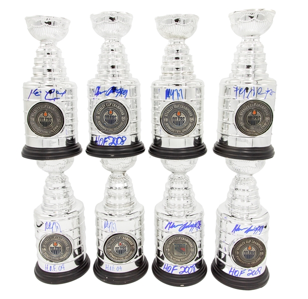 Edmonton Oilers Signed 1984, 1985, 1987, 1988, 1990 Mini Stanley Cup Collection of 7 with Paul Coffey, Glenn Anderson, Kevin Lowe and Petr Klima - COAs Plus 1994 Glenn Anderson Rangers Cup