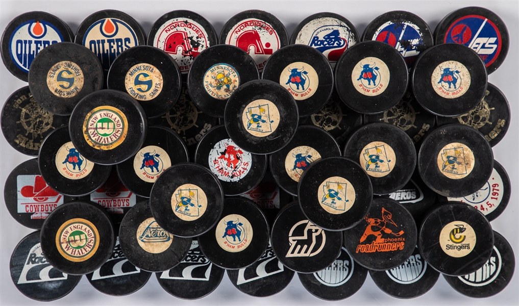 1972-1979 Biltrite, Art Ross, Viceroy and Other Maker WHA Game Puck Collection of 50 with LOA