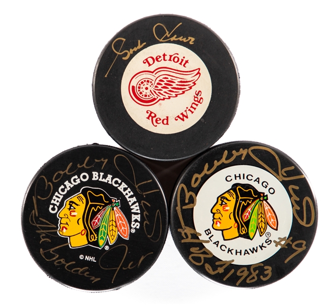 Deceased HOFers Bobby Hull (2) and Gordie Howe Signed Pucks - All PSA/DNA Certified