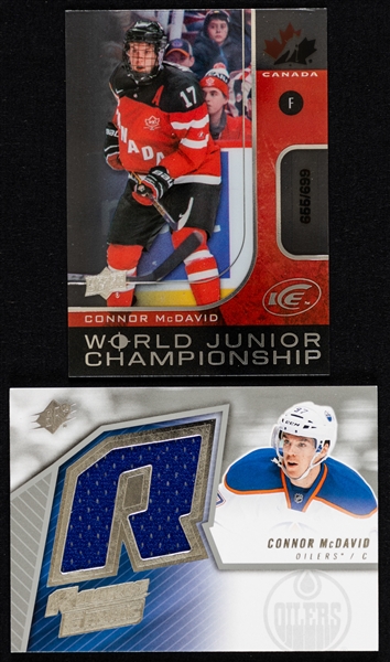 2015-16 UD SPx Retro Rookie Jerseys Hockey Card #SPXR-CM Connor McDavid and 2015-16 UD Ice World Junior Championship Hockey Card #WJ-CM Connor McDavid Rookie (655/699)