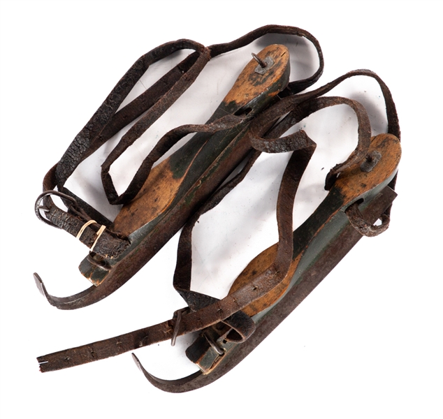 Scarce Mid-1850s Blacksmith Made Skates with Wooden Violin Shaped Platforms and Dark Green Milk Paint