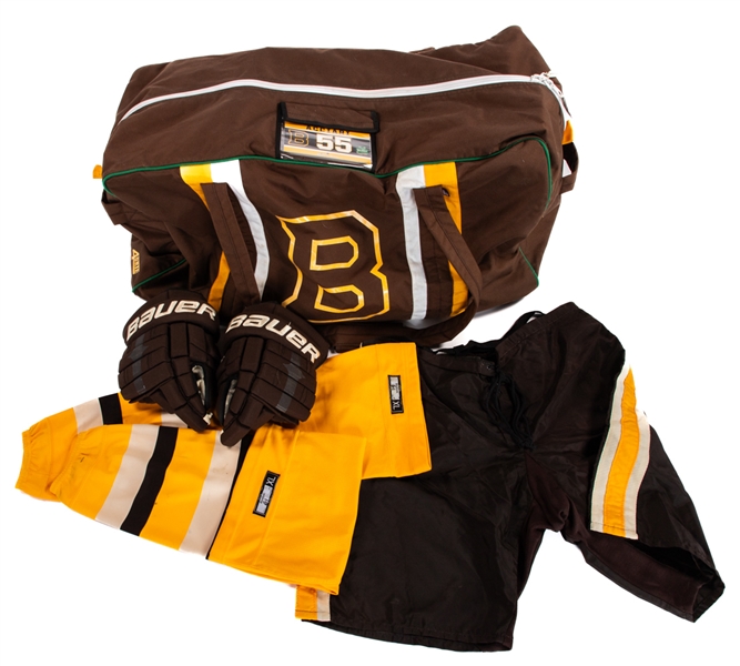 Byron Bitzs 2010 Winter Classic Boston Bruins Game-Used Bauer Gloves and Socks and Johnny Boychuks Game-Used Pants Plus 2019 Winter Classic Noel Acciaris Boston Bruins Game-Used Equipment Bag LOAs