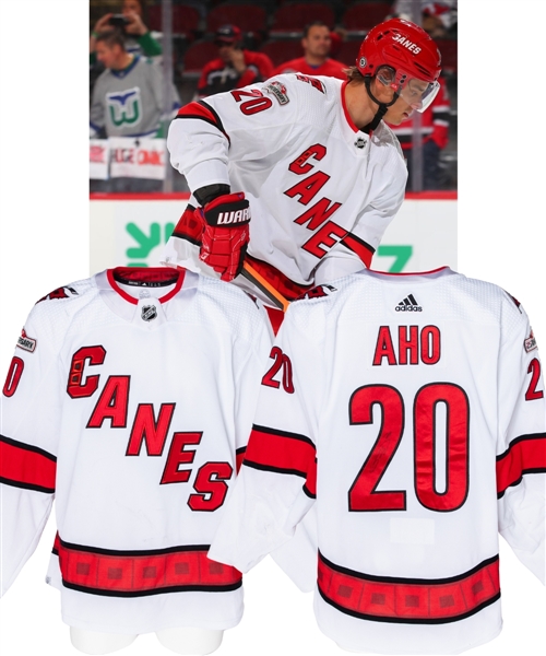 Sebastian Ahos 2022-23 Carolina Hurricanes Game-Worn Jersey with Team COA - Nice Game-Wear! - Numerous Team Repairs! - 25th Anniversary Patch!