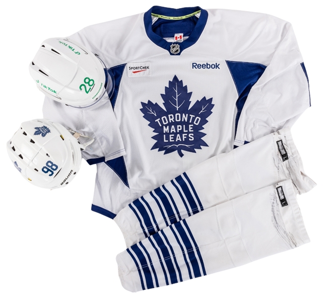 Toronto Maple Leafs Player-Worn Equipment Collection of 4 Including Sam Laffertys 2022-23 "St. Pats" Game-Worn Helmet and 2016-17 Practice-Worn Jersey Plus More - Team LOAs!