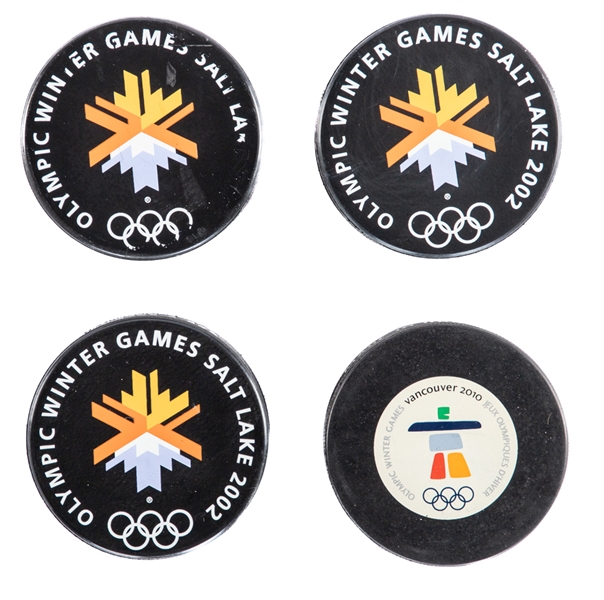 Salt Lake City 2002 (3) and Vancouver 2010 Winter Olympics Official Game Puck Collection of 3