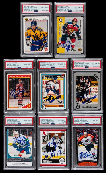 1990-91 to 2017-18 Signed Hockey Cards (8) Including Lidstrom RC, Marchand, Zubov, Niedermayer (2), Boeser and Others (PSA/DNA Certified Authentic Autographs) 