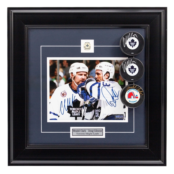 Doug Gilmour and Wendel Clark Dual-Signed Framed Toronto Maple Leafs Photo Plus Wendel Clark Signed Pucks (3) with JSA Auction LOA