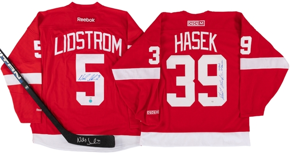 Dominik Hasek & Nicklas Lidstrom Signed Detroit Jerseys + Niklas Sundstrom Signed Stick (Each PSA/DNA Certified)