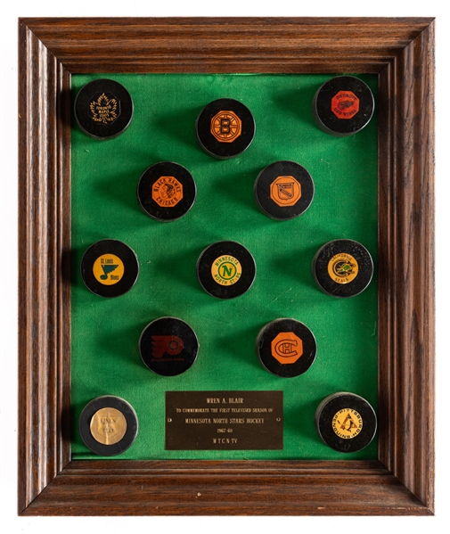 1967-68 Art Ross / Converse NHL Pucks Complete Set (12) Framed Display Originally Presented to Wren Blair For the Minnesota North Stars First Televised Season (21" x 25")