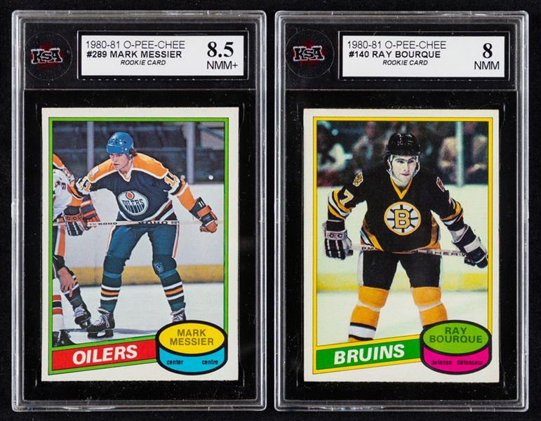 1980-81 O-Pee-Chee Hockey Card #289 HOFer Mark Messier Rookie (Graded KSA 8.5) and 1980-81 O-Pee-Chee Hockey Card #140 HOFer Ray Bourque Rookie (Graded KSA 8)