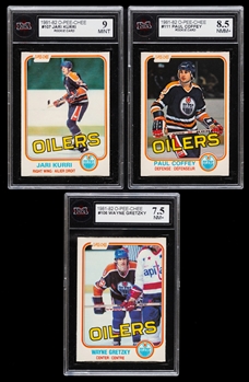 1981-82 O-Pee-Chee Hockey Card #107 HOFer Jari Kurri Rookie (Graded KSA 9), #111 HOFer Paul Coffey Rookie (Graded KSA 8.5) and #106 HOFer Wayne Gretzky (Graded KSA 7.5)