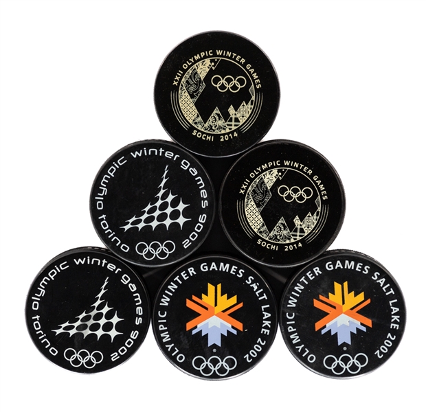 IIHF and Olympic Games Game Puck and Souvenir Puck Collection of 17 from Kimmo Leinonens Personal Collection with LOA