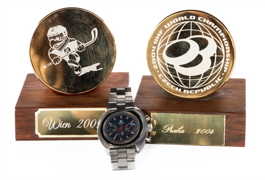 1982 IIHF "Player of the Game" Tissot Seastar Chronograph Watch Plus 2004 & 2005 IIHF World Championships Golden Pucks Gifts from Kimmo Leinonens Personal Collection with LOA