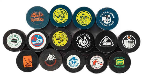 Frank Browns 1972-79 WHA Biltrite, Art Ross, CCM and Viceroy Game Puck and Souvenir Puck Collection of 34 from His Personal Collection with LOA 