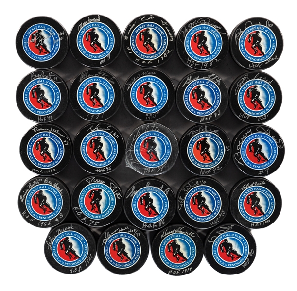 Hockey Hall of Fame Signed Puck Collection of 24 Including Deceased HOFers Hull, Salming, Bouchard, Howell, Pilote, Pronovost, Francis, Stanley, Smith and Moore with LOA