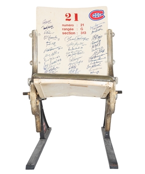 Montreal Forum White Single Seat Multi-Signed by 36 Past Canadiens Including HOFers Cournoyer, Lapointe, Savard, Houle, Gainey, Shutt, Laperriere, Robinson, Carbonneau, Mahovlich, Vachon and Bowman 