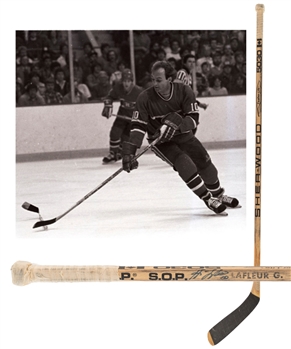 Guy Lafleurs Early-to-Mid-1980s Montreal Canadiens Twice-Signed Sher-Wood 5030 Game-Used Stick with JSA LOA 
