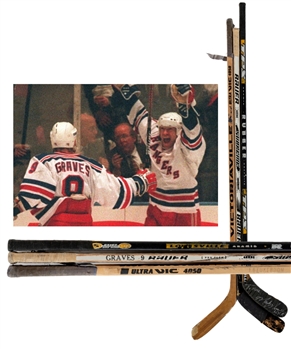 Mark Messiers Early-2000s TPS Rubber, Adam Graves Early-2000s Bauer Supreme and Jeff Beukebooms Mid-1990s Vic 4050 New York Rangers Signed Game-Used Sticks 