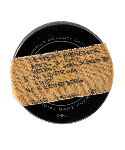 Nicklas Lidstroms Detroit Red Wings April 3rd, 2011 Goal Puck with HockeyTown Authentics COA - Season Goal #16 of 16 / Career Goal #253 of 264