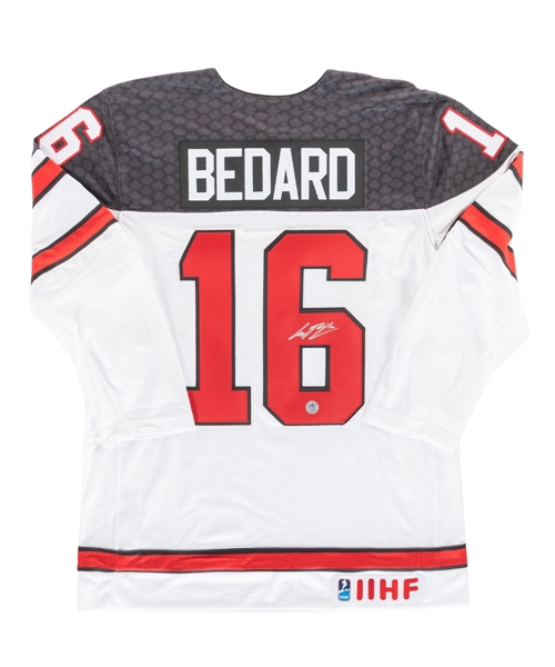 Connor Bedard Signed Team Canada IIHF World Junior Championship Nike Jersey and Puck - Both AJ Sports Certified!