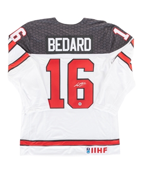 Connor Bedard Signed Team Canada IIHF World Junior Championship Nike Jersey and Puck - Both AJ Sports Certified!