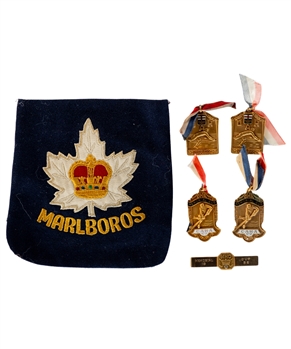 T. P. Toppings 1955 and 1956 Toronto Marlboros Ontario Hockey Association and Memorial Cup Medals, 1956 Memorial Cup Birks 10K Tie Clip and Marlboros Blazer Patch