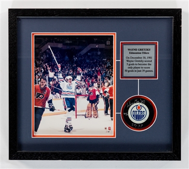 Wayne Gretzky December 30th, 1981 "50 in 39" Edmonton Oilers Signed Puck Display with WGA COA (16 1/2" x 14 1/2")